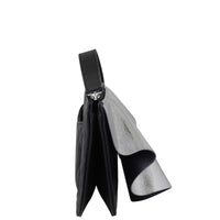 Chanel Metallic Wave Clutch Side