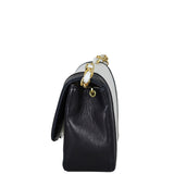 Chanel Vintage Vertical Quilt Flap Bag Side