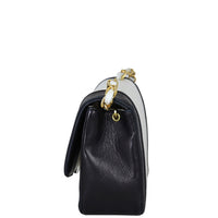 Chanel Vintage Vertical Quilt Flap Bag Side