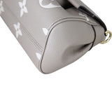 Louis Vuitton Favorite Monogram Empreinte Giant Bicolour Corner Close Up