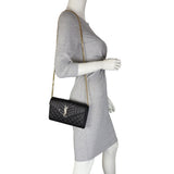 Saint Laurent Monogram Mix Matelasse Envelope Wallet on Chain Mannequin