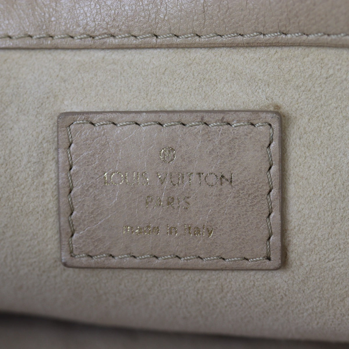 Louis Vuitton  Stratus Monogram Olympe
