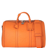 Gucci GG Embossed Duffle Bag Small