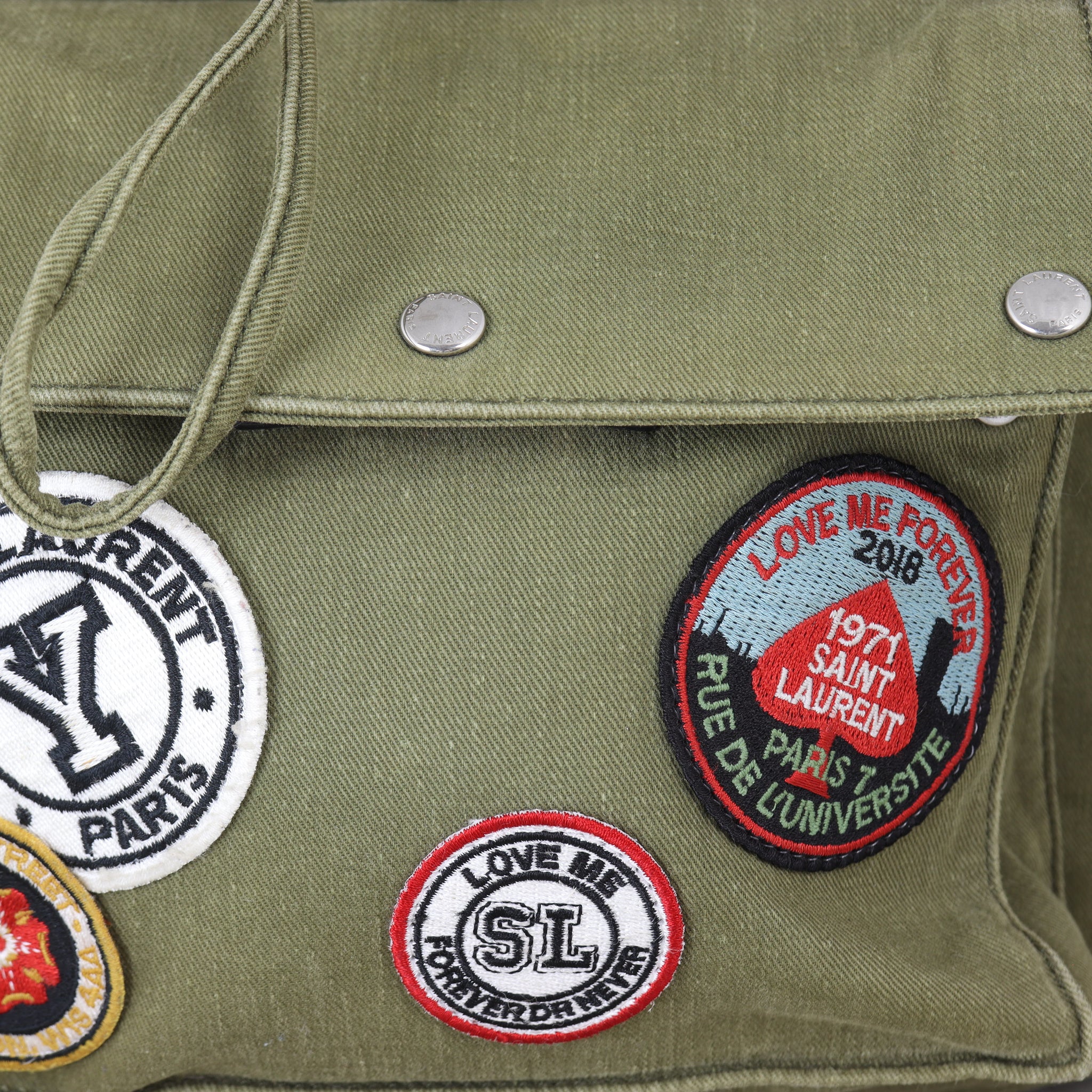 Saint Laurent Noe Canvas Multi Patch Backpack