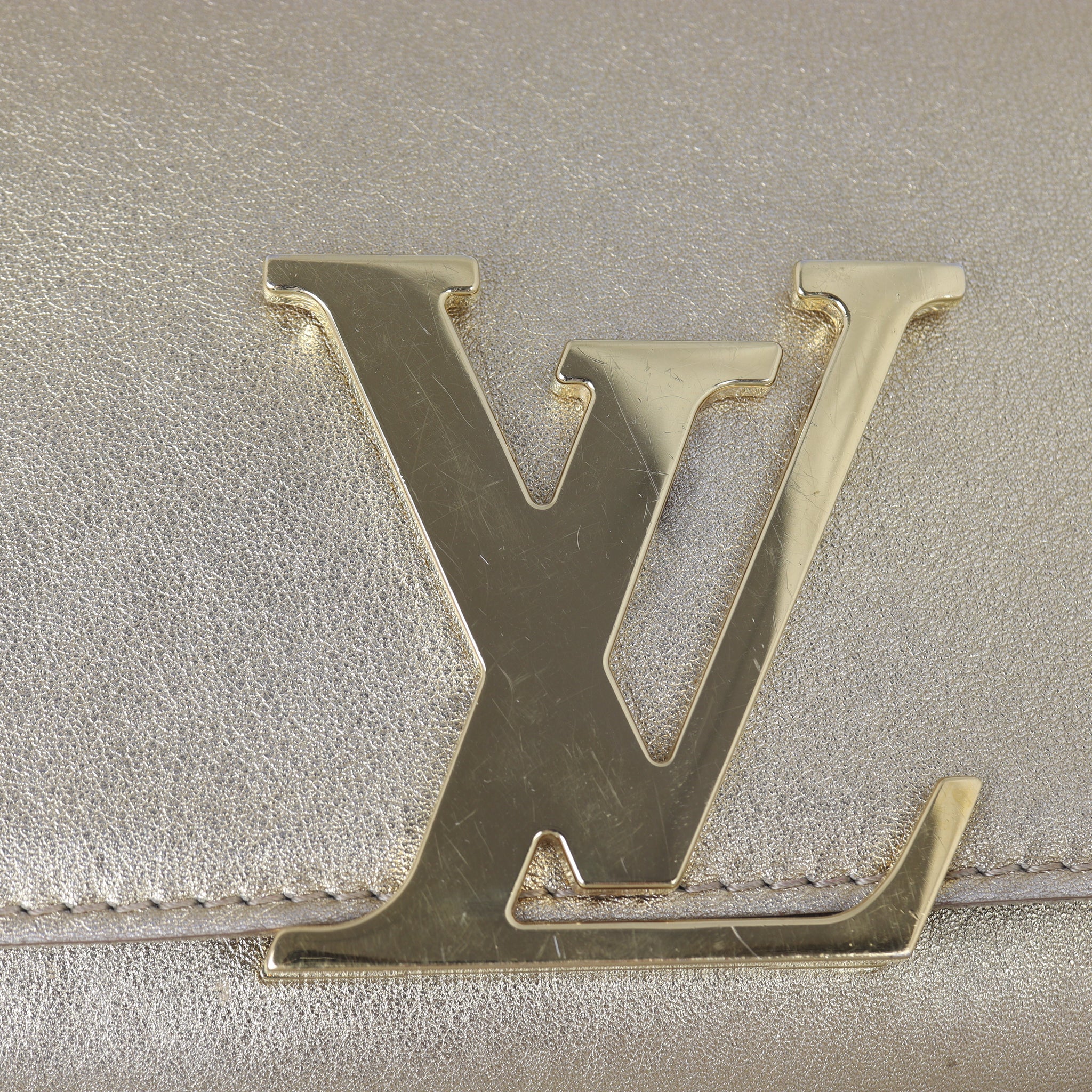 Louis Vuitton Louise Clutch