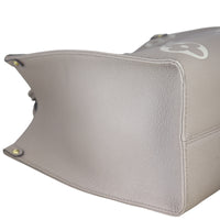 Louis Vuitton OnTheGo MM Monogram Empreinte Giant Bicolour