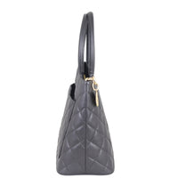 Chanel Medallion Tote Side
