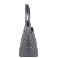 Chanel Medallion Tote Side
