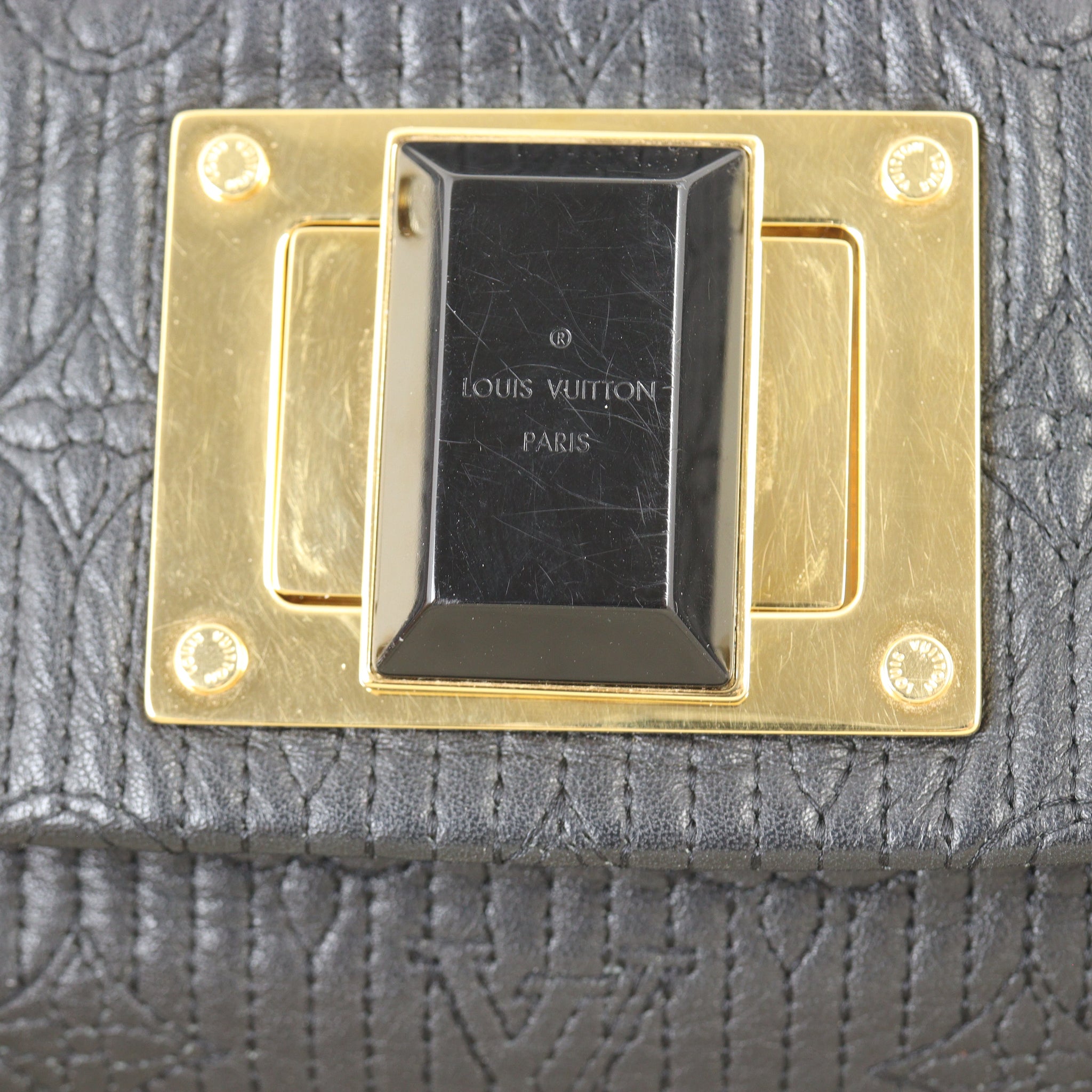 Louis Vuitton Altair Clutch Monogram Motard