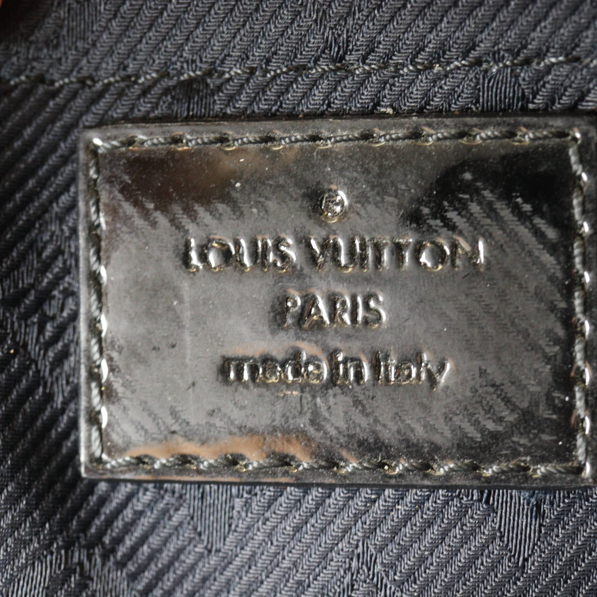 Louis Vuitton Altair Clutch Monogram Motard