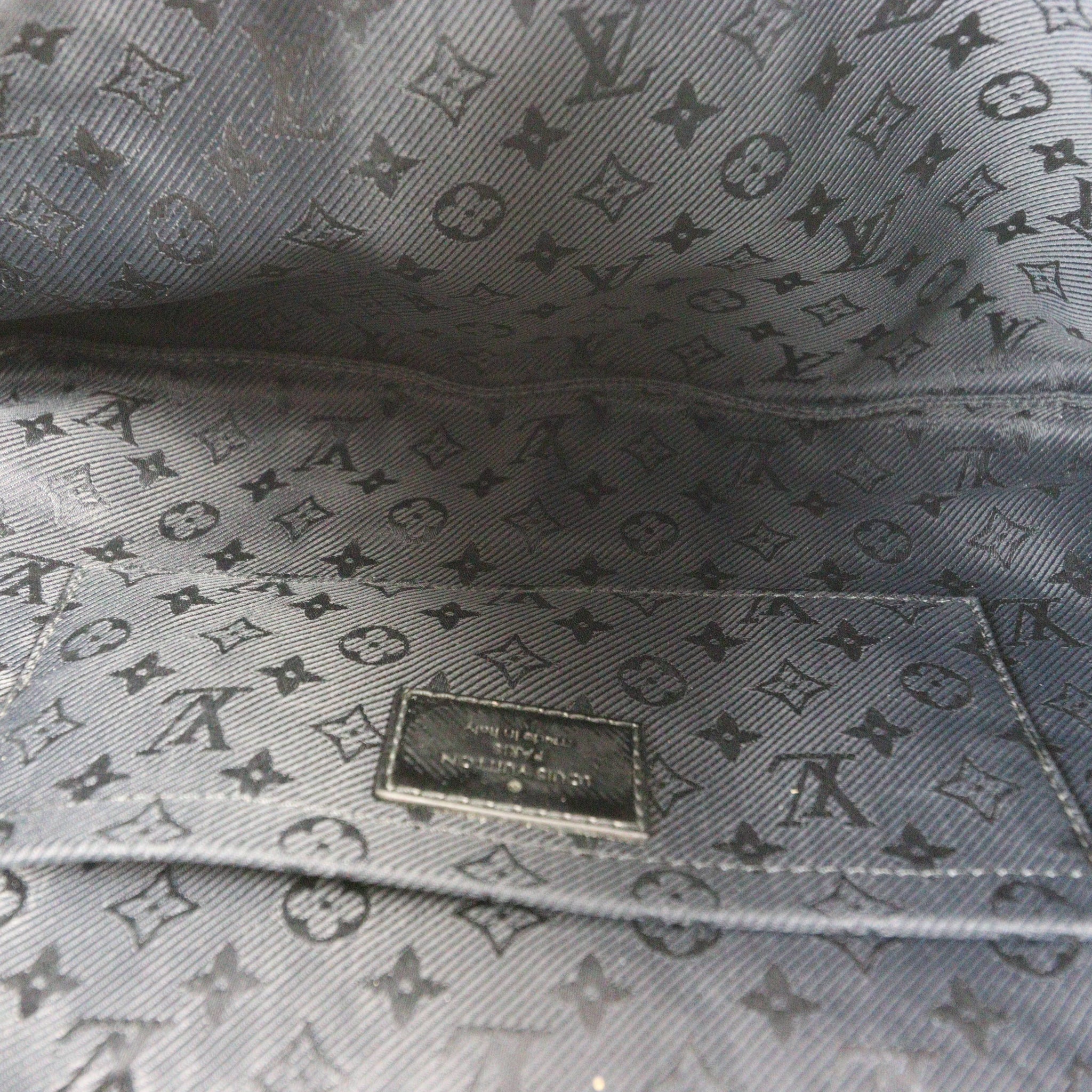 Louis Vuitton Altair Clutch Monogram Motard