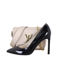 Louis Vuitton LockMe Tender