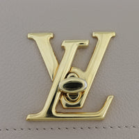 Louis Vuitton LockMe Tender