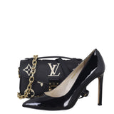 Louis Vuitton Pochette Metis East West Monogram Empreinte Giant Bicolour