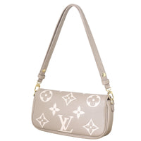 Louis Vuitton Ivy Wallet on Chain Monogram Empreinte Giant Bicolour_IMG_8343.jpeg