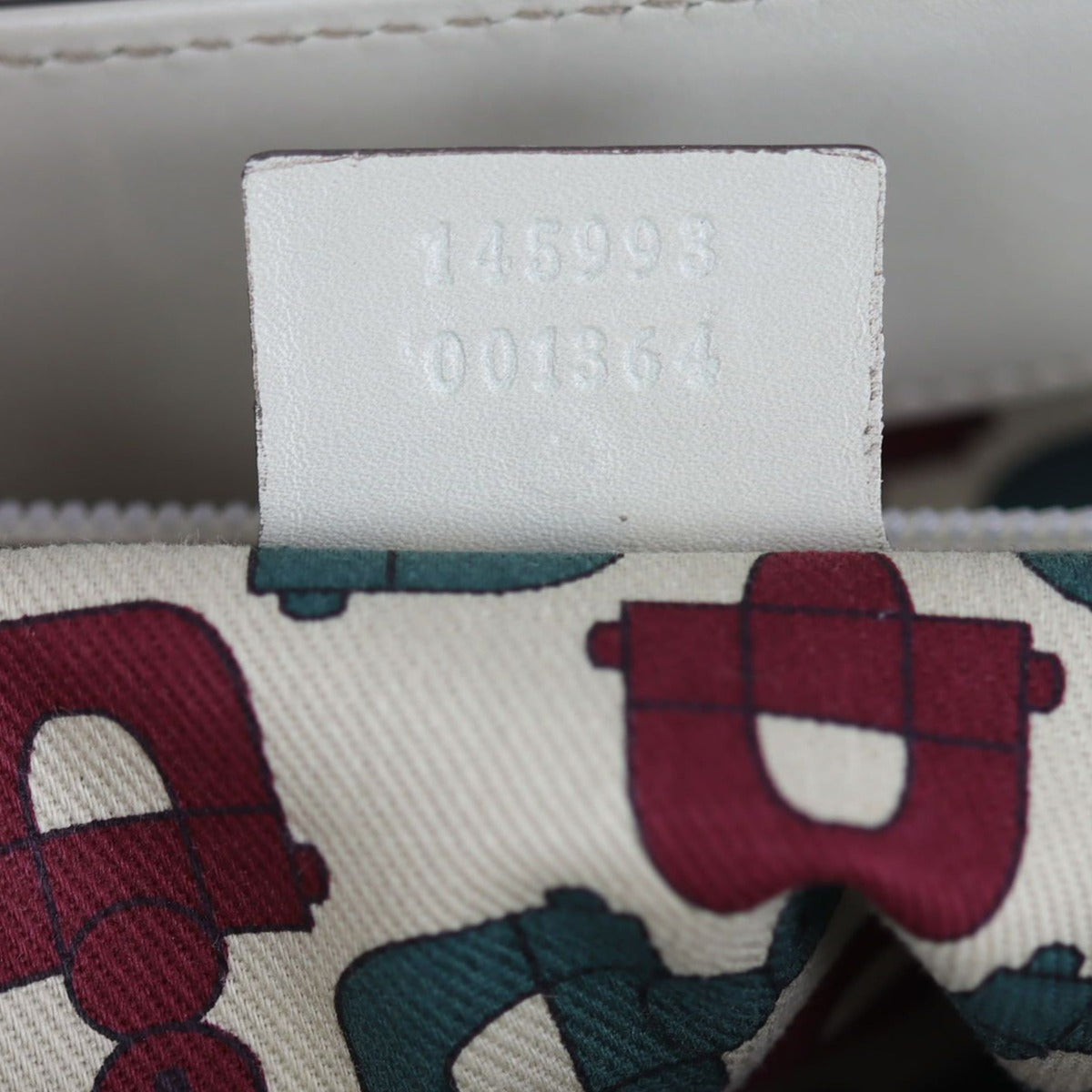 Gucci Guccissima Punch Tote Date code
