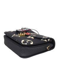 Louis Vuitton Pochette Metis Monogram Empreinte Giant Crafty Corner Closeup