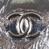 Chanel Metallic Wave Clutch Logo