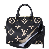 Louis Vuitton Speedy 25 Bandouliere Monogram Empreinte Giant Bicolour Front with Shoe