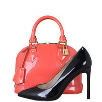 Louis Vuitton Alma BB Monogram Vernis front with shoe