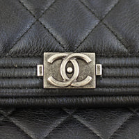 Chanel Boy Flap Clutch Logo