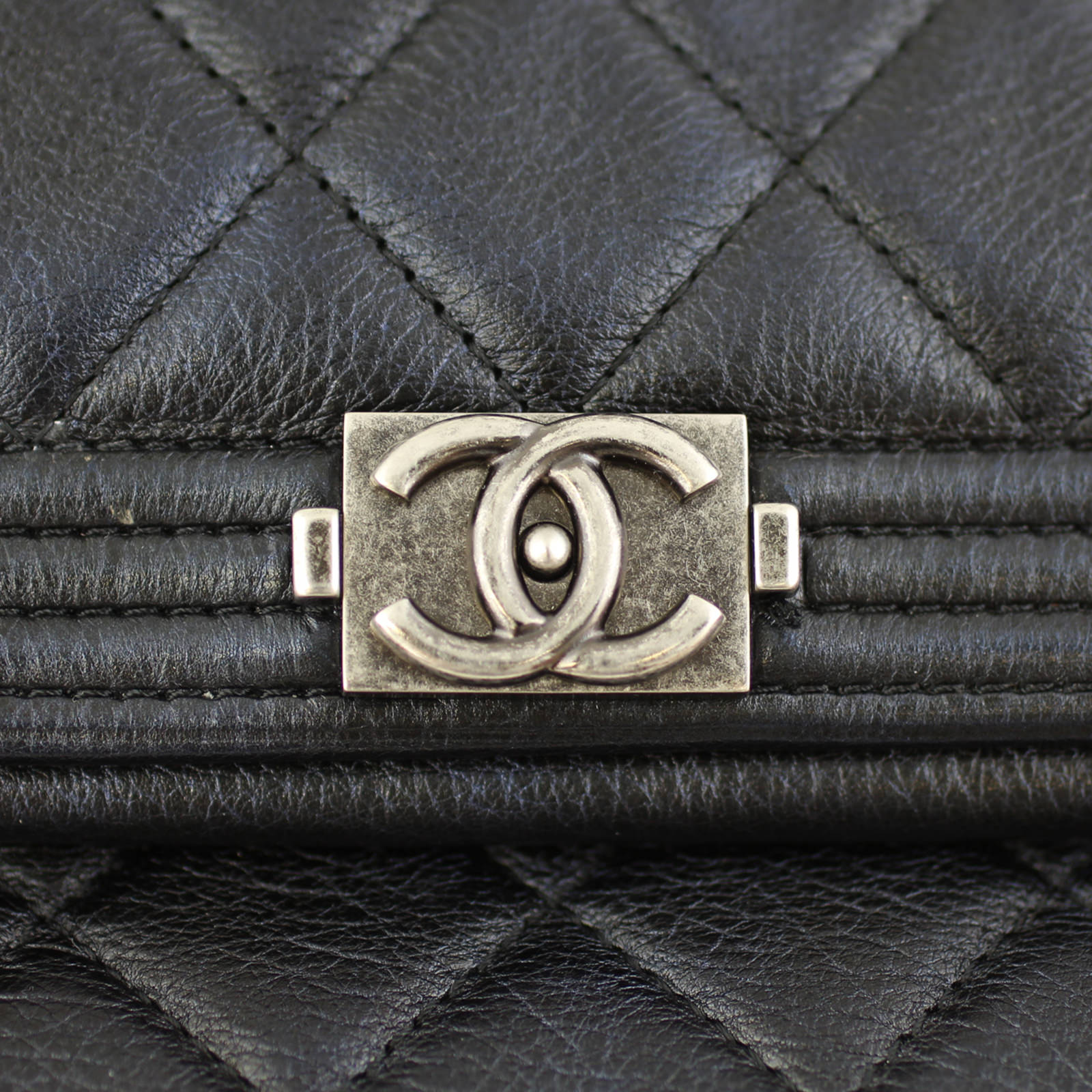 Chanel Boy Flap Clutch Logo