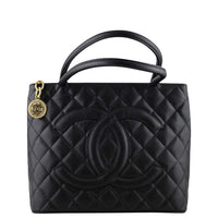 Chanel Medallion Tote Handles from front