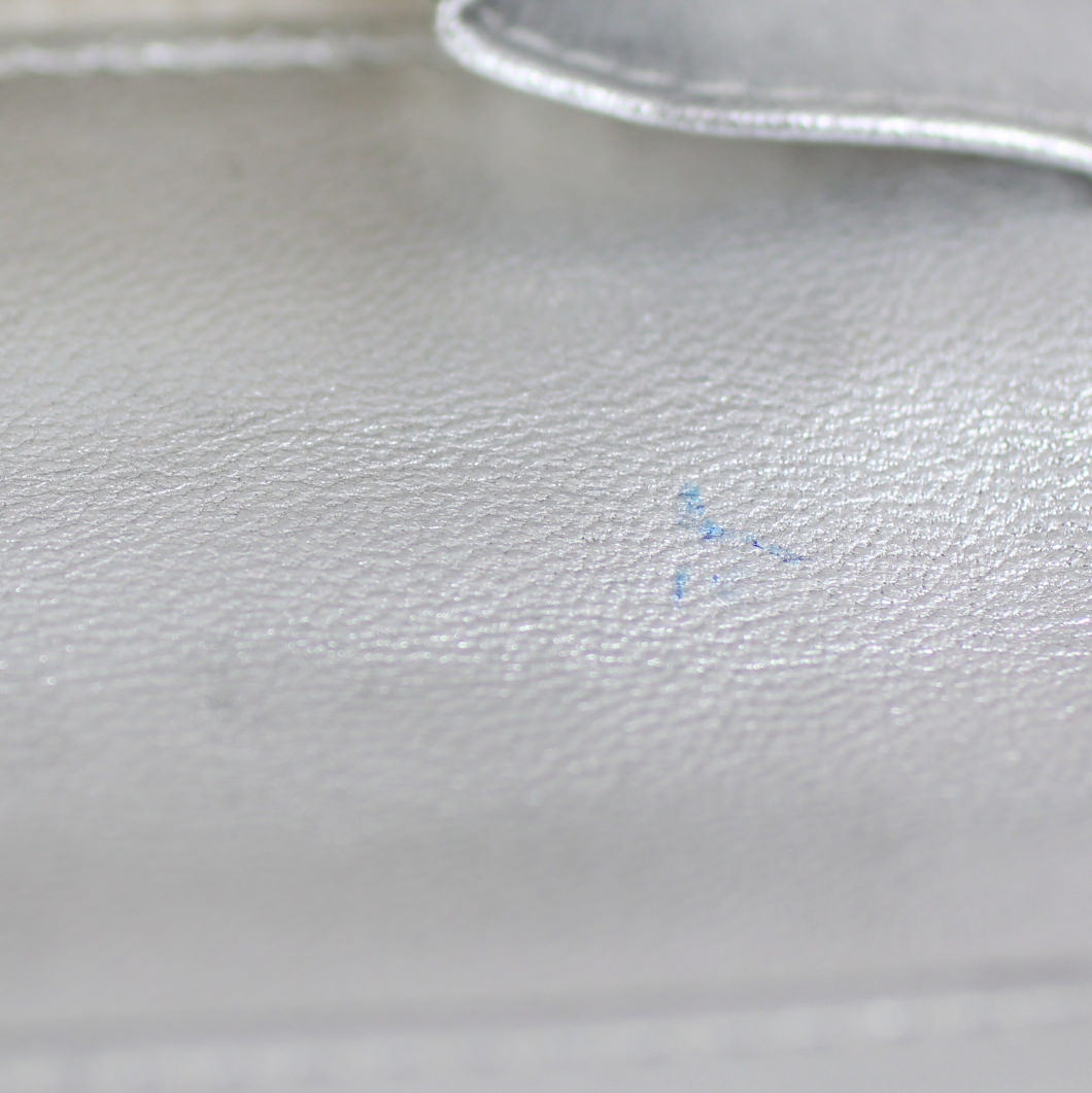 Chanel Precious Symbols Yen Wallet Stain