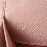 Prada Saffiano Metal Continental Wallet Date code