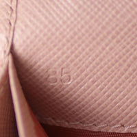 Prada Saffiano Metal Continental Wallet Date code