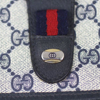 Gucci GG Supreme Vintage Clutch Hardware