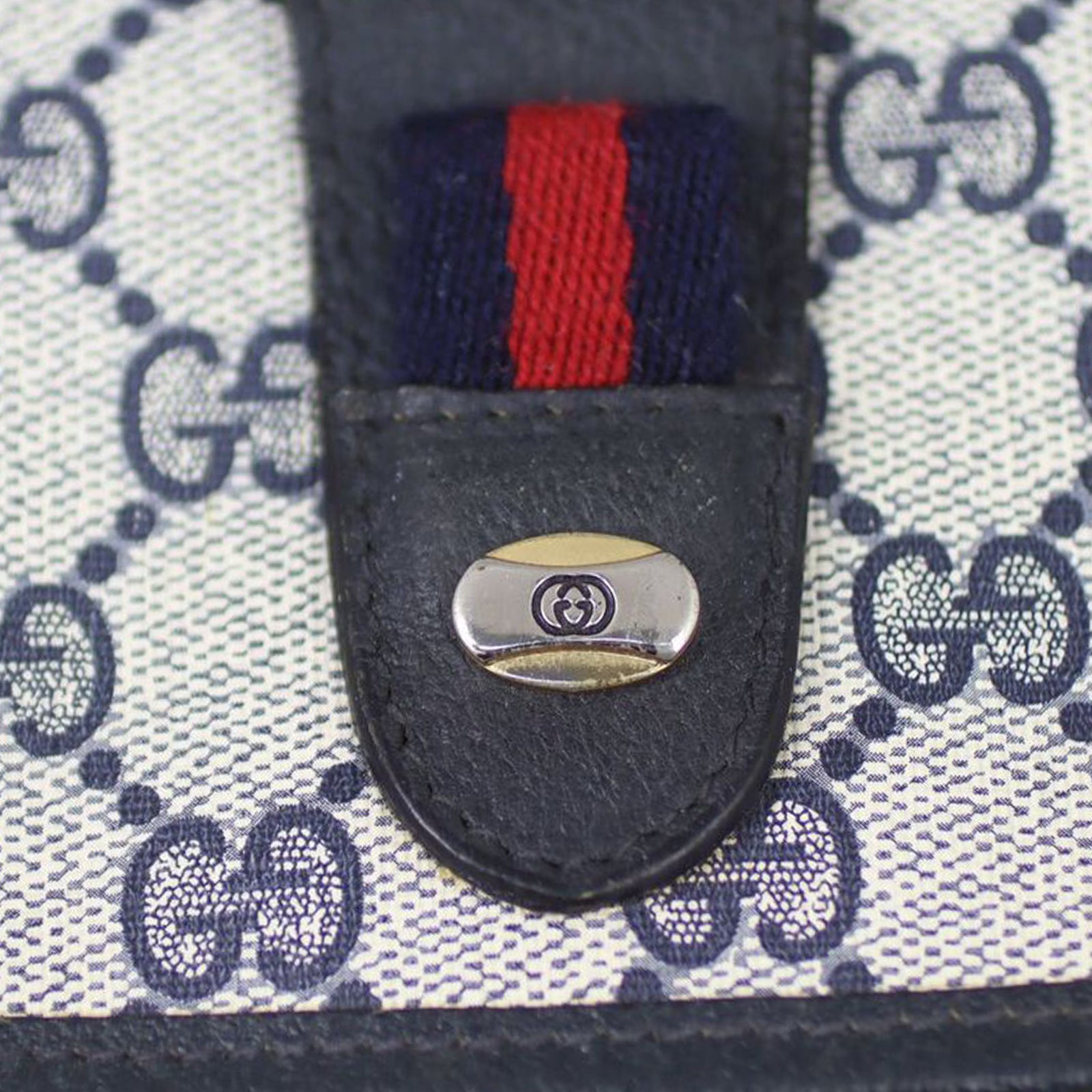 Gucci GG Supreme Vintage Clutch Hardware