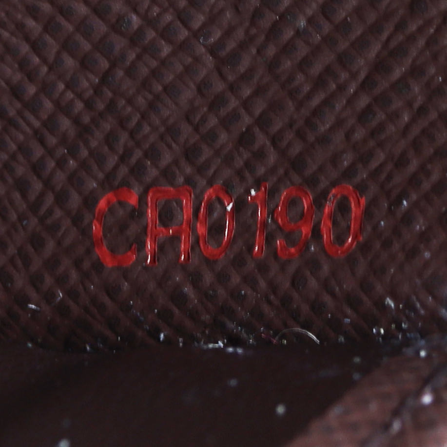 Louis Vuitton Zippy Wallet Damier Ebene Date Code