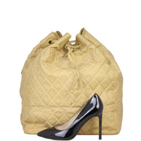 Chanel Quilted CC Drawstring Bucket Bag | Beige