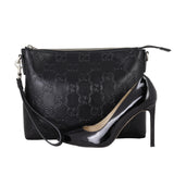 Gucci GG Embossed Messenger Bag