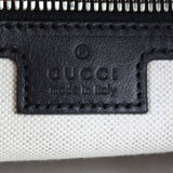 Gucci GG Embossed Messenger Bag