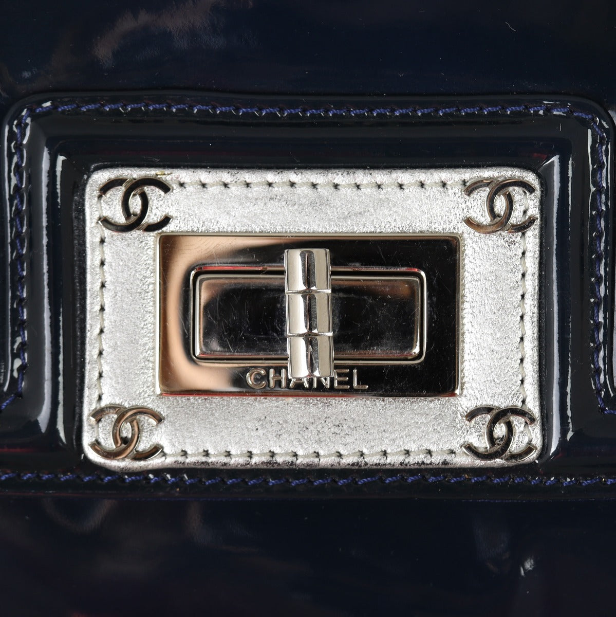 Chanel Mademoiselle Lock Patent Leather Clutch bag Hardware
