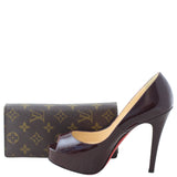 Louis Vuitton Brazza Wallet Monogram Scale