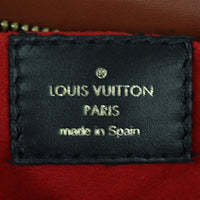 Louis Vuitton Tuileries Pochette Monogram Interior Stamp