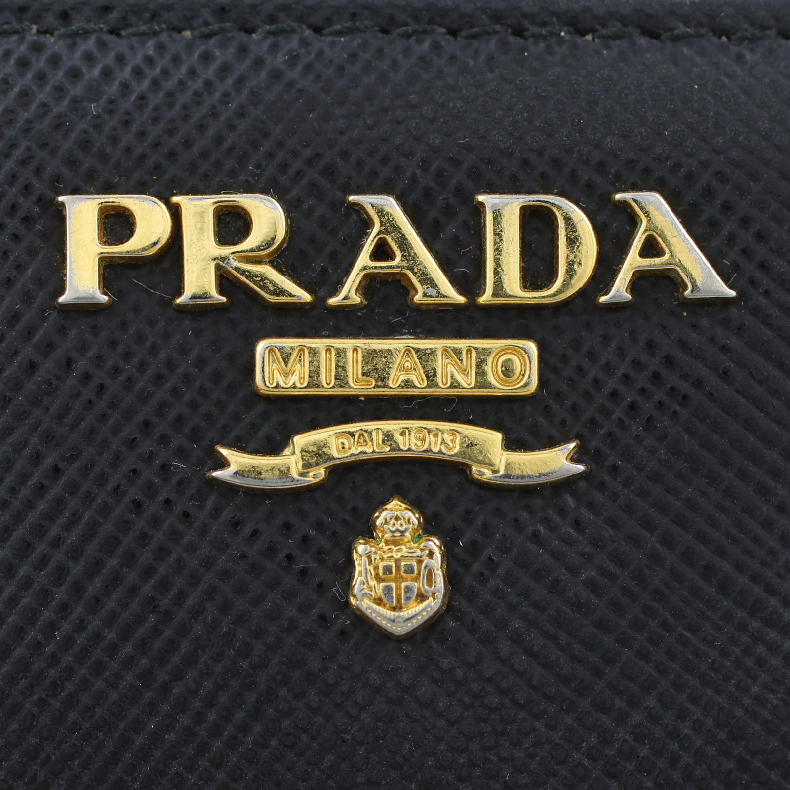 Prada Saffiano Zippy Wallet Logo