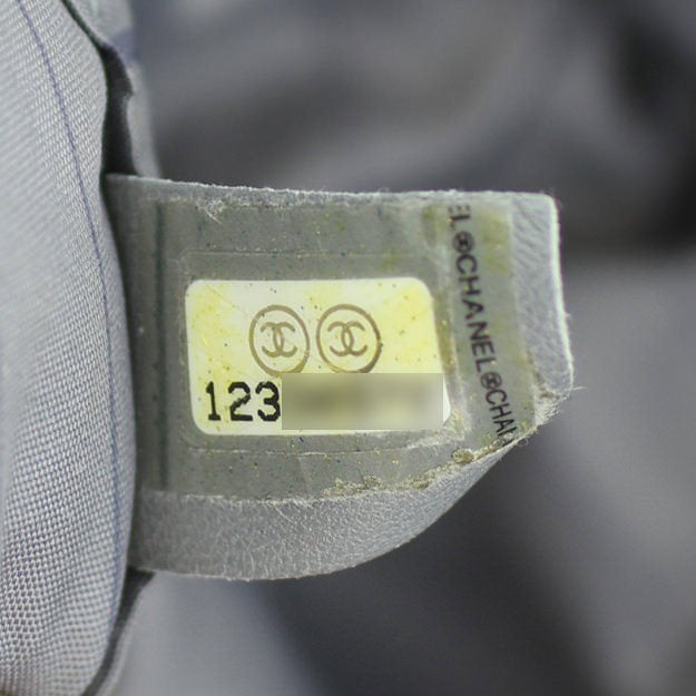 Chanel Diagonal Zip Bowler Bag code