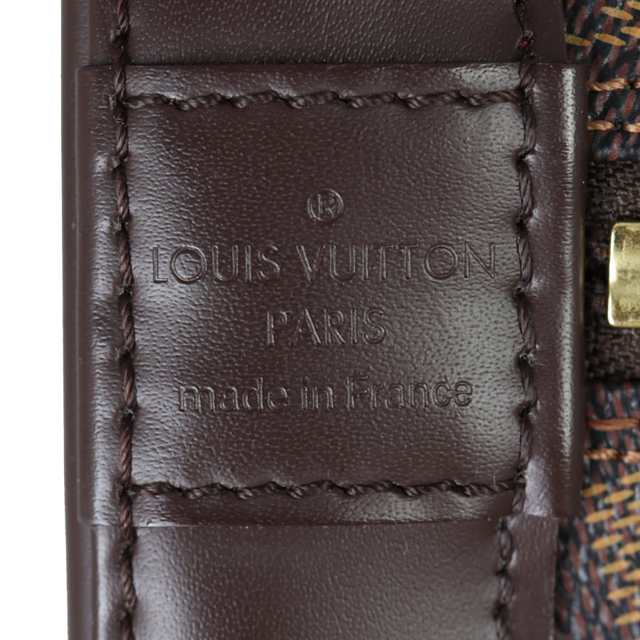 Louis Vuitton Alma PM Damier Ebene with Strap Interior Stamp