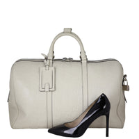 Gucci GG Embossed Duffle Bag