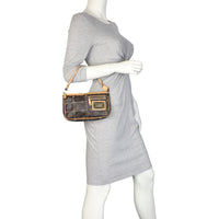 Louis Vuitton Riveting Pochette Monogram