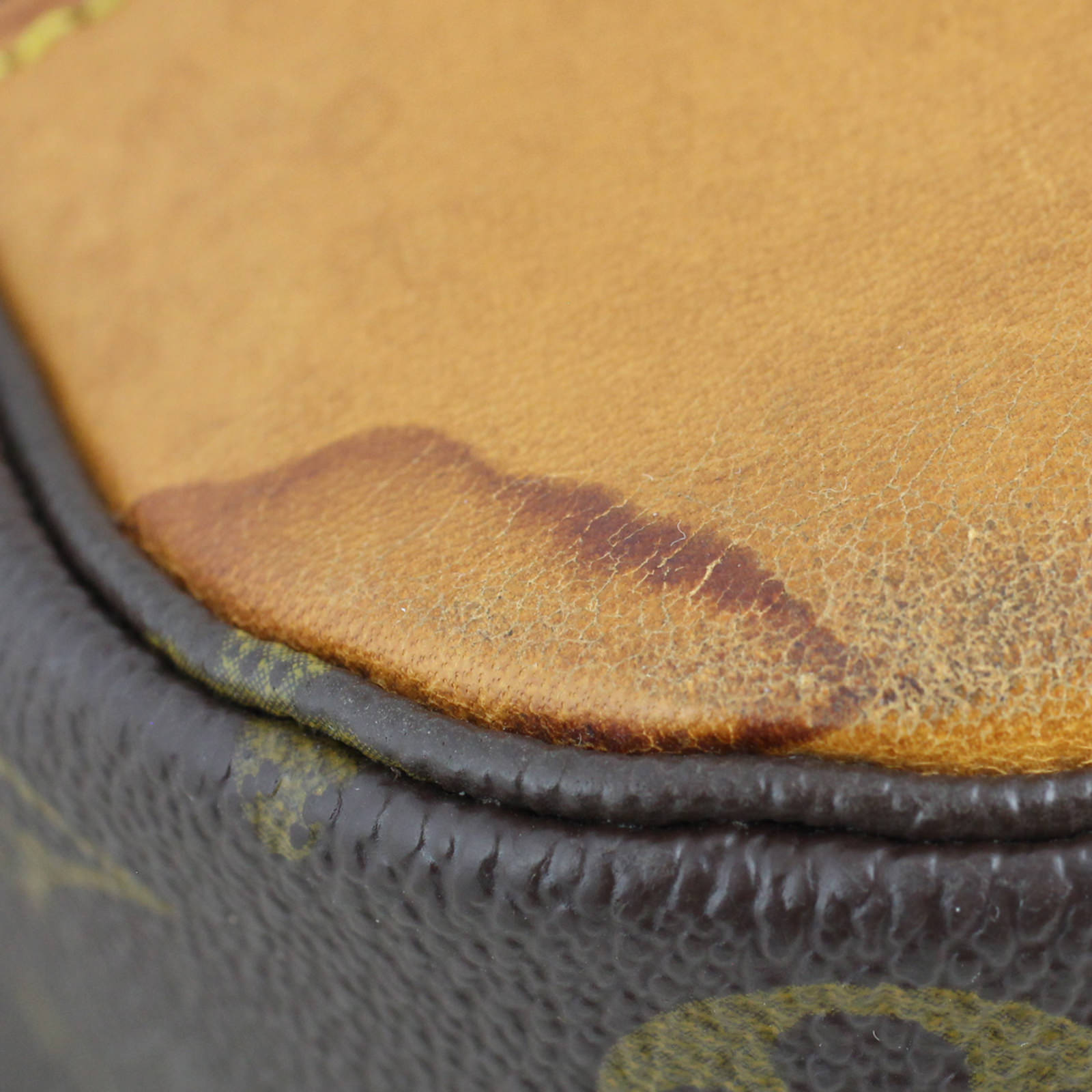 Louis Vuitton Boulogne 35 Monogram Stain