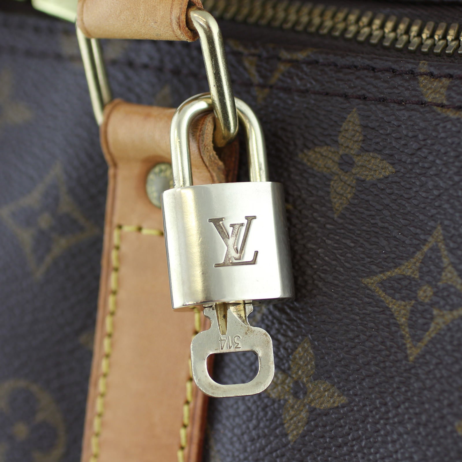 Louis Vuitton Keepall 55 Monogram Lock
