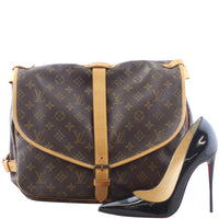Louis Vuitton Saumur 35 Monogram Scale