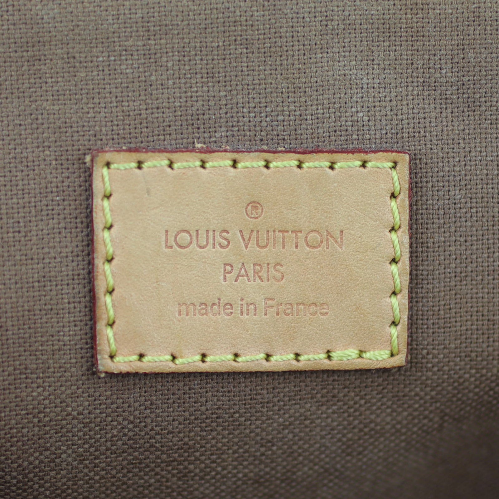 Louis Vuitton Tivoli Monogram Stamp