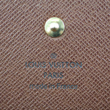 Louis Vuitton Porte Tresor International Wallet Monogram Stamp