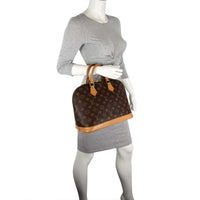 Louis Vuitton Alma Monogram PM Scale